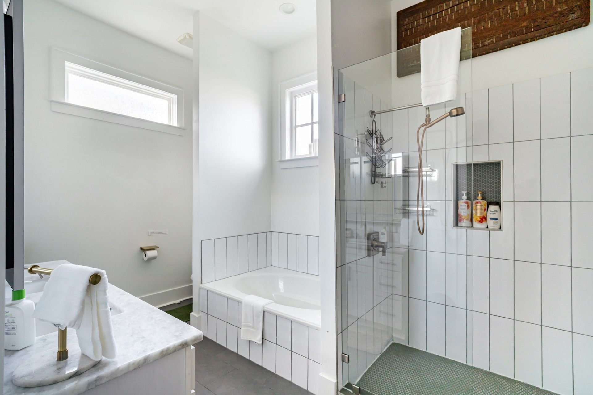 Primary bathroom shower and tub